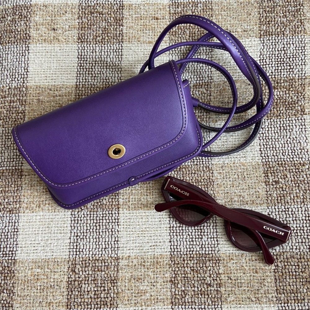 Coach sunglasses with a small pochette